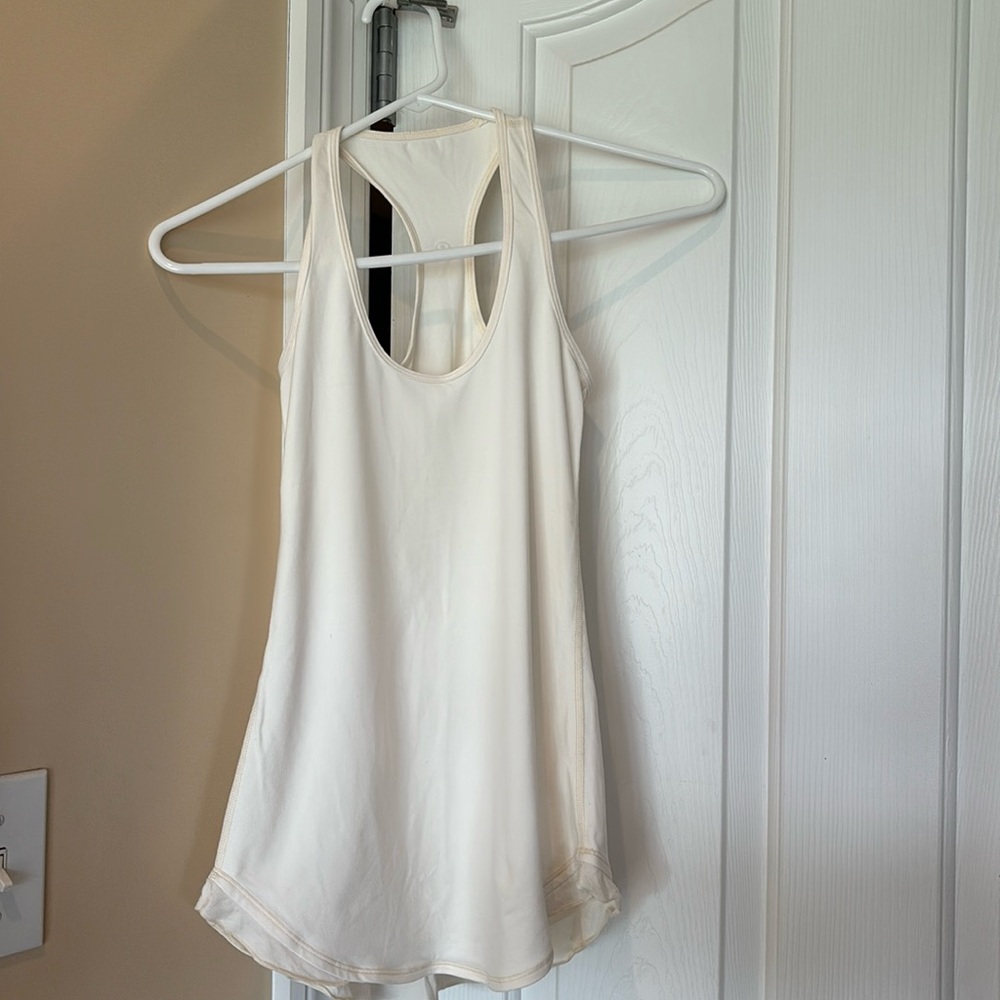 #13 Lululemon size 2 off white tank top with ruffles